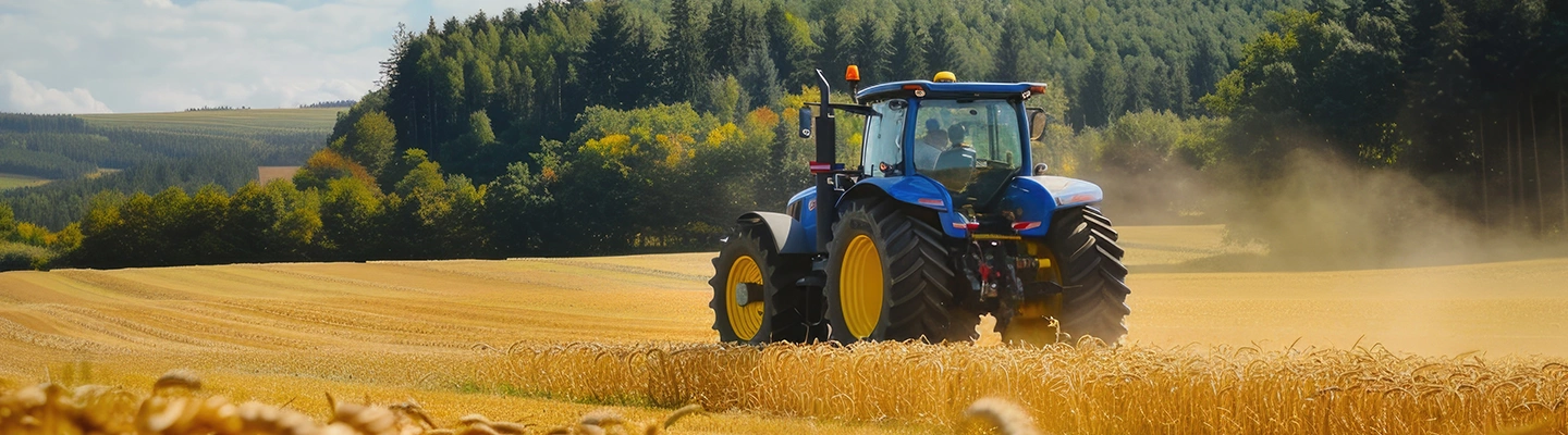 Tratcor driving in wheat field